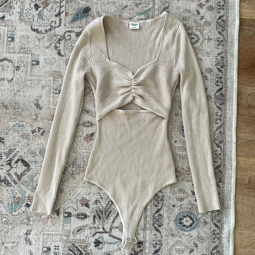 Abercrombie cinched cutout sweater bodysuit. Size small. Color is cream.